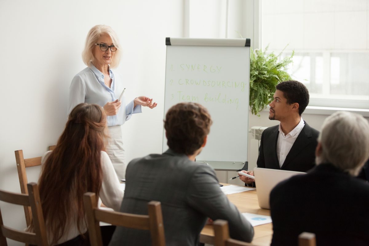 Businesswoman giving presentation at entrepreneur session