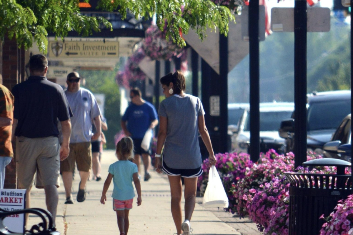 Family walking down the street of downtown Bluffton